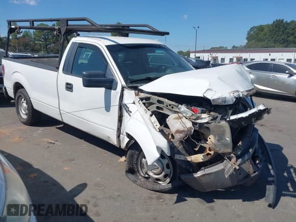 ✅ 2011 Ford F-150 XL • VIN: 1FTNF1CFXBKD71717 • Lot: 43185498. Listed on IAAI with 201,430 mi. Free auction sales archive from the USA and detailed vehicle history report at DreamBid. Image 1.