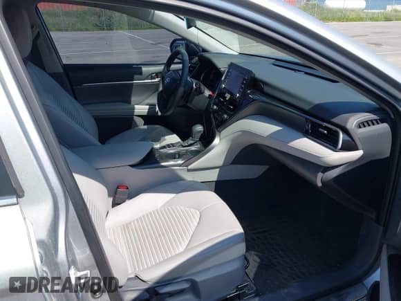 2021 Toyota Camry Hybrid SE z VIN 4T1G31AKXMU562641, wystawiony jako IAAI lot #42415712 z przebiegiem 71 085 mil mil oraz . Historia ofert i sprzedaży dostępna na DreamBid. Obrazek 5.