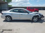 ✅ 2002 Pontiac Grand Am SE1 • VIN: 1G2NF52F12C269276 • Lot: 42581456. Listed on IAAI with 317,082 mi. Free auction sales archive from the USA and detailed vehicle history report at DreamBid. Image 13.