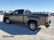 ✅ 2015 GMC Canyon 2WD SLE • VIN: 1GTH5BEA7F1144066 • Lot: 90898695. Listed on Copart with 111,679 mi. Free auction sales archive from the USA and detailed vehicle history report at DreamBid. Image 2.