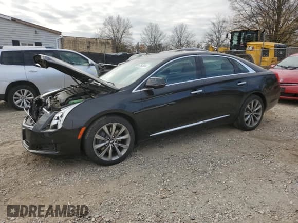✅ 2017 Cadillac XTS • VIN: 2G61L5S32H9128230 • Лот: 81761074. Опубликован ранее на Copart с пробегом 82 118 миль. Бесплатный доступ к архиву аукционных продаж из США и подробный отчёт об истории автомобиля на DreamBid. Изображение 1.