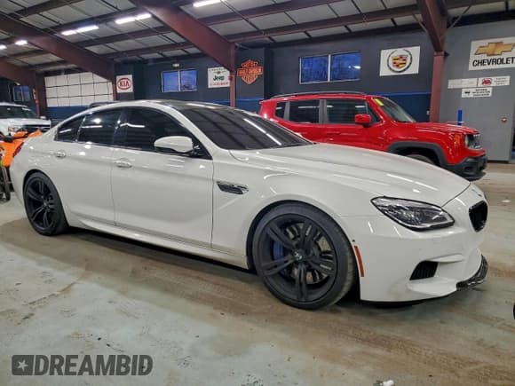 ✅ 2016 BMW M6 • VIN: WBS6E9C56GG437177 • Lot: 95513235. Listed on Copart with 146,871 mi. Free auction sales archive from the USA and detailed vehicle history report at DreamBid. Image 4.
