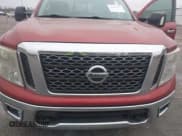 ✅ 2017 Nissan Titan Platinum Reserve • VIN: 1N6AA1E68HN501105 • Лот: 43823327. Опубликован ранее на IAAI с пробегом 203 611 миль. Бесплатный доступ к архиву аукционных продаж из США и подробный отчёт об истории автомобиля на DreamBid. Изображение 6.