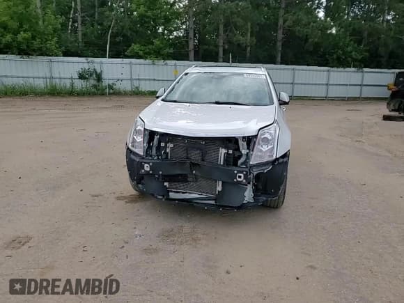 ✅ 2016 Cadillac SRX Premium Collection • VIN: 3GYFNDE34GS552894 • Lot: 64945985. Listed on Copart with 105,751 mi. Free auction sales archive from the USA and detailed vehicle history report at DreamBid. Image 14.