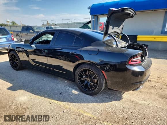2021 Dodge Charger SXT с VIN 2C3CDXBG4MH642294, выставлен на аукционе Copart как лот 81025785 с пробегом 83 600 миль миль и Списание • Salvage title. История ставок и продаж доступна на DreamBid. Изображение 2.