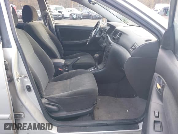 ✅ 2003 Toyota Corolla CE • VIN: 2T1BR32E73C100342 • Lot: 43569405. Listed on IAAI with 299,999 mi. Free auction sales archive from the USA and detailed vehicle history report at DreamBid. Image 5.