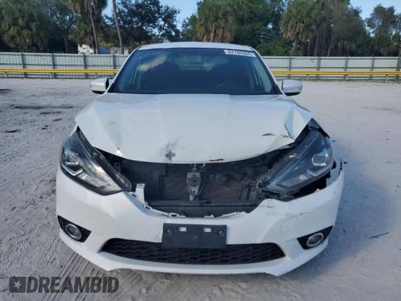 2017 Nissan Sentra SR с VIN 3N1AB7AP3HY405230, выставлен на аукционе Copart как лот 82769365 с пробегом 122 209 миль миль и Списание • Salvage title. История ставок и продаж доступна на DreamBid. Изображение 5.