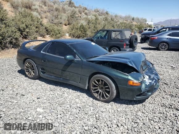 ✅ 1998 Mitsubishi 3000GT • VIN: JA3AM44H2WY004088 • Lot: 67243365. Wystawiony na Copart z przebiegiem 160 933 mil. Bezpłatny archiwum sprzedaży aukcyjnych z USA i szczegółowy raport historii pojazdu na DreamBid. Zdjęcie 4.