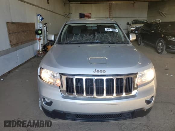 ✅ 2012 Jeep Grand Cherokee Laredo • VIN: 1C4RJFAG7CC149608 • Лот: 91670075. Опубликован ранее на Copart с пробегом 216 255 миль. Бесплатный доступ к архиву аукционных продаж из США и подробный отчёт об истории автомобиля на DreamBid. Изображение 5.
