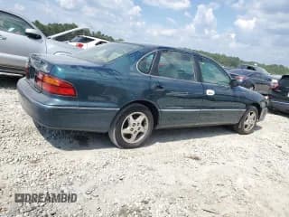 ✅ 1998 Toyota Avalon XL • VIN: 4T1BF18B0WU279966 • Лот: 66705614. Опубликован ранее на Copart с пробегом Не указан. Бесплатный доступ к архиву аукционных продаж из США и подробный отчёт об истории автомобиля на DreamBid. Изображение 3.