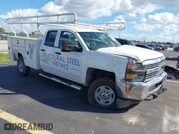 ✅ 2015 Chevrolet Silverado 2500HD Work Truck • VIN: 1GB2CUEGXFZ511799 • Лот: 43329692. Опубликован ранее на IAAI с пробегом 74 004 миль. Бесплатный доступ к архиву аукционных продаж из США и подробный отчёт об истории автомобиля на DreamBid. Изображение 1.