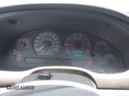 ✅ 1999 Ford Mustang • VIN: 1FAFP4046XF202967 • Lot: 42574831. Wystawiony na IAAI z przebiegiem 138 068 mil. Bezpłatny archiwum sprzedaży aukcyjnych z USA i szczegółowy raport historii pojazdu na DreamBid. Zdjęcie 7.