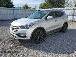 2018 Hyundai Santa Fe 2.0T z VIN 5XYZUDLA7JG557507, wystawiony jako Copart lot #84480945 z przebiegiem 106 770 mil mil oraz Czysty tytuł • Clean title. Historia ofert i sprzedaży dostępna na DreamBid. Obrazek 1.