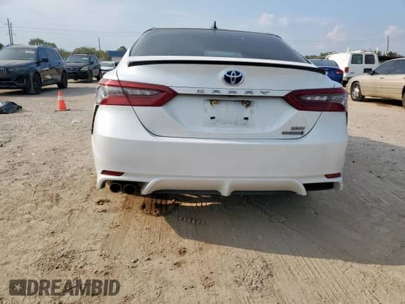 2021 Toyota Camry Hybrid XSE с VIN 4T1K31AK0MU026419, выставлен на аукционе Copart как лот 81029735 с пробегом 153 313 миль миль и Списание • Salvage title. История ставок и продаж доступна на DreamBid. Изображение 6.