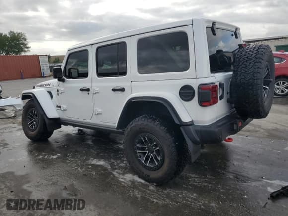 ✅ 2024 Jeep Wrangler Rubicon X • VIN: 1C4RJXFG9RW263065 • Lot: 54869435. Listed on Copart with 6,219 mi. Free auction sales archive from the USA and detailed vehicle history report at DreamBid. Image 2.