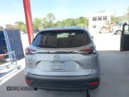 ✅ 2018 Mazda CX-9 Sport • VIN: JM3TCABYXJ0230442 • Лот: 42118134. Опубликован ранее на IAAI с пробегом 81 800 миль. Бесплатный доступ к архиву аукционных продаж из США и подробный отчёт об истории автомобиля на DreamBid. Изображение 17.