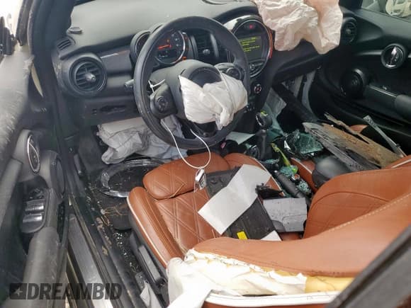 ✅ 2017 MINI Convertible Cooper • VIN: WMWWG5C32H3C20341 • Lot: 57039685. Listed on Copart with 100,575 mi. Free auction sales archive from the USA and detailed vehicle history report at DreamBid. Image 8.