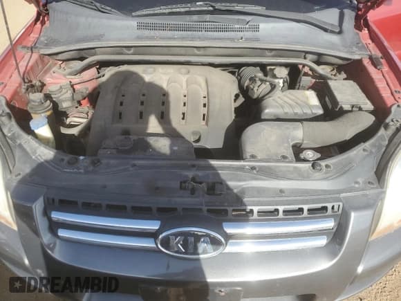 ✅ 2007 Kia Sportage LX • VIN: KNDJE723877361998 • Lot: 52724125. Wystawiony na Copart z przebiegiem 149 420 mil. Bezpłatny archiwum sprzedaży aukcyjnych z USA i szczegółowy raport historii pojazdu na DreamBid. Zdjęcie 12.