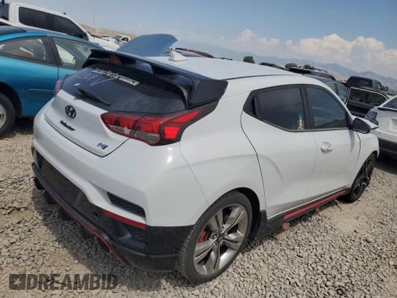 2020 Hyundai Veloster z VIN KMHT36AH1LU006944, wystawiony jako Copart lot #66895134 z przebiegiem Nie podano mil oraz Czysty tytuł • Clean title. Historia ofert i sprzedaży dostępna na DreamBid. Obrazek 3.