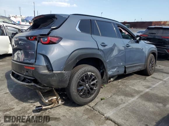 ✅ 2025 Mazda CX-50 Hybrid Premium Package • VIN: 7MMVAADWXSN120093 • Lot: 65423715. Wystawiony na Copart z przebiegiem 4 829 mil. Bezpłatny archiwum sprzedaży aukcyjnych z USA i szczegółowy raport historii pojazdu na DreamBid. Zdjęcie 3.