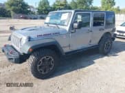 ✅ 2016 Jeep Wrangler Unlimited Rubicon • VIN: 1C4BJWFG4GL145354 • Lot: 43238324. Listed on IAAI with 125,574 mi. Free auction sales archive from the USA and detailed vehicle history report at DreamBid. Image 2.