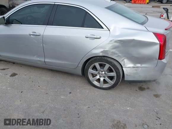 ✅ 2013 Cadillac ATS • VIN: 1G6AA5RA0D0140438 • Lot: 41102721. Listed on IAAI with 65,767 mi. Free auction sales archive from the USA and detailed vehicle history report at DreamBid. Image 6.