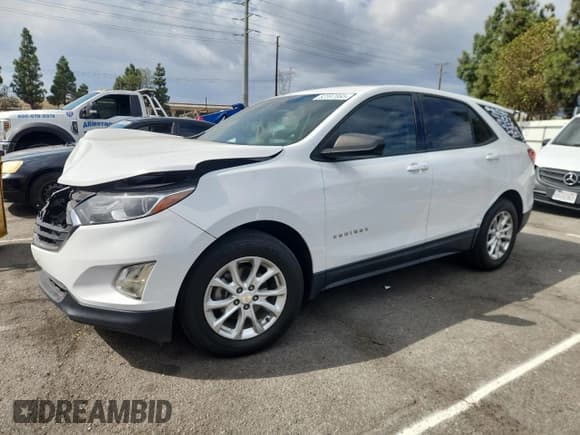 ✅ 2018 Chevrolet Equinox LS • VIN: 2GNAXHEVXJ6281369 • Lot: 82397065. Listed on Copart with 89,914 mi. Free auction sales archive from the USA and detailed vehicle history report at DreamBid. Image 1.