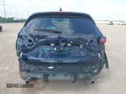 ✅ 2023 Mazda CX-5 S Carbon Edition • VIN: JM3KFBCM6P0165036 • Lot: 42622732. Listed on IAAI with 44,497 mi. Free auction sales archive from the USA and detailed vehicle history report at DreamBid. Image 17.