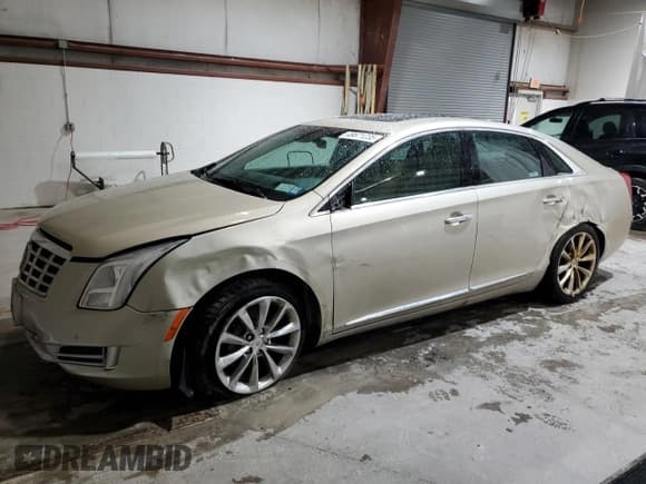 ✅ 2014 Cadillac XTS Premium • VIN: 2G61R5S32E9151209 • Lot: 49671235. Wystawiony na Copart z przebiegiem 114 401 mil. Bezpłatny archiwum sprzedaży aukcyjnych z USA i szczegółowy raport historii pojazdu na DreamBid. Zdjęcie 1.