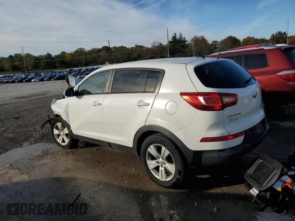 ✅ 2013 Kia Sportage LX • VIN: KNDPB3A25D7423079 • Lot: 90927215. Wystawiony na Copart z przebiegiem 196 102 mil. Bezpłatny archiwum sprzedaży aukcyjnych z USA i szczegółowy raport historii pojazdu na DreamBid. Zdjęcie 2.