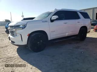 ✅ 2021 Chevrolet Tahoe High Country • VIN: 1GNSKTKLXMR309141 • Лот: 65782665. Опубликован ранее на Copart с пробегом 89 452 миль. Бесплатный доступ к архиву аукционных продаж из США и подробный отчёт об истории автомобиля на DreamBid. Изображение 1.