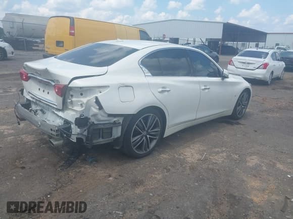 ✅ 2015 Infiniti Q50 Premium • VIN: JN1BV7AP8FM330939 • Lot: 43102515. Listed on IAAI with 139,222 mi. Free auction sales archive from the USA and detailed vehicle history report at DreamBid. Image 4.