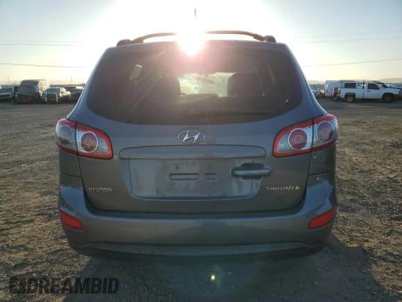 ✅ 2010 Hyundai Santa Fe GLS • VIN: 5NMSG3ABXAH379290 • Lot: 73596494. Listed on Copart with 198,173 mi. Free auction sales archive from the USA and detailed vehicle history report at DreamBid. Image 6.