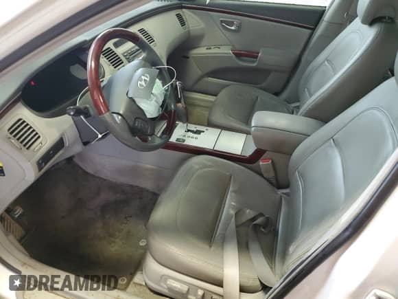 2007 Hyundai Azera SE с VIN KMHFC46F17A241134, выставлен на аукционе Copart как лот 45387245 с пробегом 143 358 миль миль и Чистый • Clean title. История ставок и продаж доступна на DreamBid. Изображение 7.