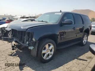 2011 Chevrolet Tahoe LS with VIN 1GNSCAE00BR186112, listed as a Copart auction lot 68344505 with 98,576 mi miles and Salvage title. Bid and sale history available at DreamBid. Image 1.