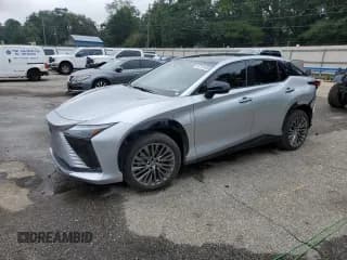 ✅ 2023 Lexus RZ 450e Premium • VIN: JTJAAAAB4PA001077 • Lot: 67181855. Listed on Copart with 9,997 mi. Free auction sales archive from the USA and detailed vehicle history report at DreamBid. Image 1.