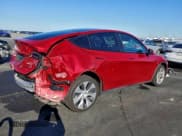 ✅ 2023 Tesla Model Y Long Range • VIN: 7SAYGDEE0PF872641 • Lot: 93860025. Wystawiony na Copart z przebiegiem 31 991 mil. Bezpłatny archiwum sprzedaży aukcyjnych z USA i szczegółowy raport historii pojazdu na DreamBid. Zdjęcie 3.