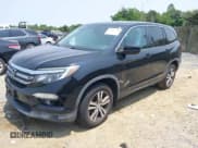 ✅ 2017 Honda Pilot EX-L • VIN: 5FNYF5H50HB018073 • Lot: 42417778. Listed on IAAI with 60,784 mi. Free auction sales archive from the USA and detailed vehicle history report at DreamBid. Image 18.