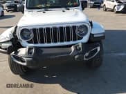 ✅ 2024 Jeep Wrangler Sahara • VIN: 1C4PJXEN3RW105988 • Lot: 71717955. Listed on Copart with 17,691 mi. Free auction sales archive from the USA and detailed vehicle history report at DreamBid. Image 13.
