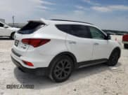 ✅ 2018 Hyundai Santa Fe Ultimate • VIN: 5NMZW4LA1JH084526 • Лот: 55074564. Опубликован ранее на Copart с пробегом 96 531 миль. Бесплатный доступ к архиву аукционных продаж из США и подробный отчёт об истории автомобиля на DreamBid. Изображение 3.