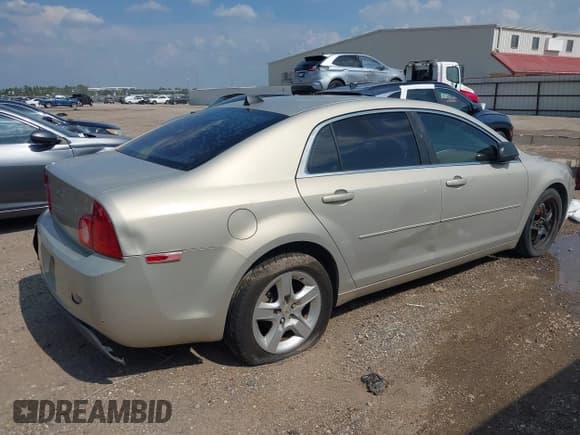 ✅ 2012 Chevrolet Malibu 1LS • VIN: 1G1ZB5E03CF106864 • Lot: 43016130. Listed on IAAI with 284,047 mi. Free auction sales archive from the USA and detailed vehicle history report at DreamBid. Image 4.