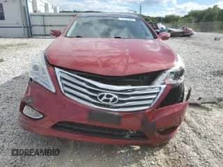 2014 Hyundai Azera Limited z VIN KMHFH4JG1EA372773, wystawiony jako Copart lot #71756304 z przebiegiem Nie podano mil oraz Szkoda całkowita • Salvage title. Historia ofert i sprzedaży dostępna na DreamBid. Obrazek 5.