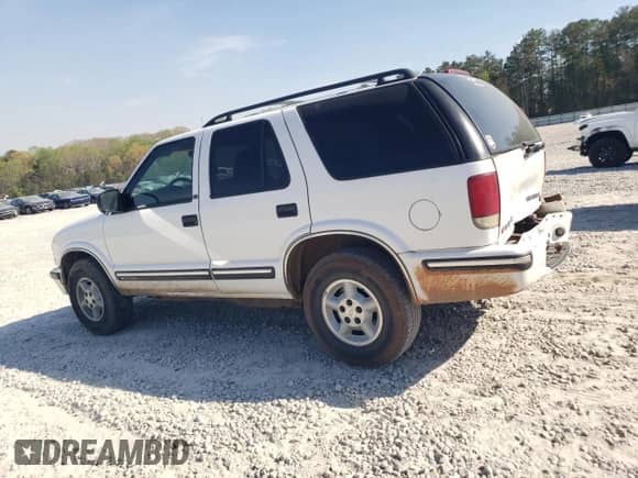 1999 Chevrolet Blazer LT z VIN 1GNDT13W7X2245446, wystawiony jako Copart lot #50569545 z przebiegiem 244 080 mil mil oraz Szkoda całkowita • Salvage title. Historia ofert i sprzedaży dostępna na DreamBid. Obrazek 2.