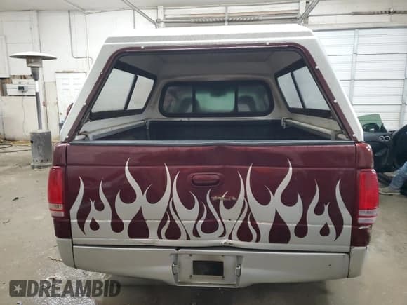 ✅ 2001 Dodge Dakota • VIN: 1B7GL22X21S148314 • Lot: 84454064. Wystawiony na Copart z przebiegiem Nie podano. Bezpłatny archiwum sprzedaży aukcyjnych z USA i szczegółowy raport historii pojazdu na DreamBid. Zdjęcie 6.