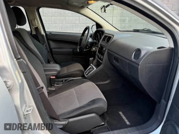 2010 Dodge Caliber SXT с VIN 1B3CB4HA1AD579409, выставлен на аукционе Copart как лот 60522605 с пробегом 100 311 миль миль и Чистый • Clean title. История ставок и продаж доступна на DreamBid. Изображение 5.