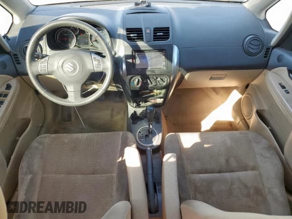 ✅ 2012 Suzuki SX4 LE • VIN: JS2YC5A37C6303297 • Lot: 91703025. Wystawiony na Copart z przebiegiem 113 870 mil. Bezpłatny archiwum sprzedaży aukcyjnych z USA i szczegółowy raport historii pojazdu na DreamBid. Zdjęcie 8.