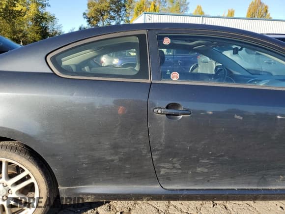 ✅ 2005 Scion tC • VIN: JTKDE177350043629 • Lot: 87303305. Listed on Copart with 93,675 mi. Free auction sales archive from the USA and detailed vehicle history report at DreamBid. Image 10.