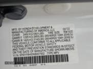 ✅ 2022 Honda Passport Elite • VIN: 5FNYF8H00NB007902 • Lot: 80935945. Listed on Copart with 97,446 mi. Free auction sales archive from the USA and detailed vehicle history report at DreamBid. Image 10.