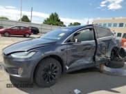 ✅ 2018 Tesla Model X 75D • VIN: 5YJXCAE28JF103725 • Лот: 63797385. Опубликован ранее на Copart с пробегом 148 943 миль. Бесплатный доступ к архиву аукционных продаж из США и подробный отчёт об истории автомобиля на DreamBid. Изображение 1.