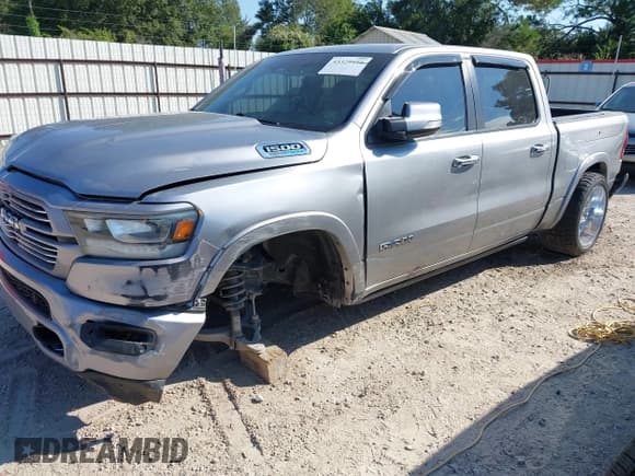 ✅ 2022 Ram 1500 Laramie • VIN: 1C6RREJTXNN125172 • Lot: 43329494. Listed on IAAI with 126,637 mi. Free auction sales archive from the USA and detailed vehicle history report at DreamBid. Image 19.